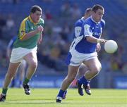 15 June 2003; Mark Rooney of Laois in action against Nicky Honan of Meath during Leinster Junior Football Championship Semi-Final match between Meath and Laois at Croke Park in Dublin. Photo by Ray McManus/Sportsfile
