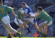 15 June 2003; Mark Rooney of Laois in action against Nicky Honan of Meath during Leinster Junior Football Championship Semi-Final match between Meath and Laois at Croke Park in Dublin. Photo by Ray McManus/Sportsfile