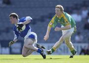 15 June 2003; Daryl Fay of Laois in action against Paddy Nugent of Meath during Leinster Junior Football Championship Semi-Final match between Meath and Laois at Croke Park in Dublin. Photo by Ray McManus/Sportsfile