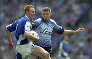 15 June 2003; Padraig Clancy of Laois in action against Darren Magee of Dublin during the Bank of Ireland Leinster Senior Football Championship Semi-Final match between Dublin and Laois at Croke Park in Dublin. Photo by Ray McManus/Sportsfile