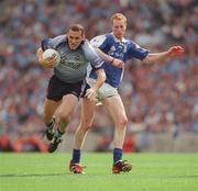 15 June 2003; Ciaran Whelan of Dublin in action against Padraig Clancy of Laois during the Bank of Ireland Leinster Senior Football Championship Semi-Final match between Dublin and Laois at Croke Park in Dublin. Photo by Ray McManus/Sportsfile