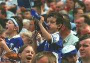 15 June 2003; Laois supporter Aaron Murphy, from Monavea, Laois, cheers on his side during the Bank of Ireland Leinster Senior Football Championship Semi-Final match between Dublin and Laois at Croke Park in Dublin. Photo by Pat Murphy/Sportsfile