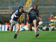 15 June 2003; Tom Mulligan of Dublin in action against Kevin Fitzpatrick of Laois during the Bank of Ireland Leinster Senior Football Championship Semi-Final match between Dublin and Laois at Croke Park in Dublin. Photo by Damien Eagers/Sportsfile