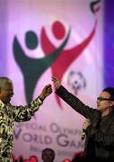 21 June 2003; Former South African president Nelson Mandela with U2 singer Bono, during the opening ceremony 2003 Special olympic world games, Croke Park, Dublin, Ireland. Pool picture credit; David Maher. *EDI*