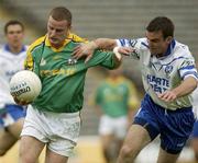 21 June 2003; Daithi Regan, Meath, in action against Monaghan's Pauric McKenna. Bank of Ireland Senior Football Championship qualifier, Monaghan v Meath, St Tighearnach's Park, Clones, Co Monaghan. Picture credit; Damien Eagers / SPORTSFILE *EDI*