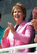 24 June 2003; President Mary McAleese applaudes the athletes in the 10,000m final during the 2003 Special Olympics World Summer Games, Morton Stadium, Santry, Dublin, Ireland. Picture credit; Ray McManus / SPORTSFILE