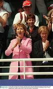 24 June 2003; President Mary McAleese, with Mary Davis, CEO of the 2003 Special Olympics World Games to her left, applaudes the athletes in the 10,000m final during the 2003 Special Olympics World Summer Games, Morton Stadium, Santry, Dublin, Ireland. Picture credit; Ray McManus / SPORTSFILE