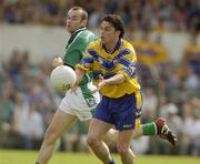 15 June 2003; Mark O'Connell, Clare, in action against Limerick's Stephen Lavin. Bank of Ireland Munster Senior Football Championship Semi-Final, Clare v Limerick, Cusack Park, Ennis, Co. Clare. Picture credit; Matt Browne / SPORTSFILE *EDI*