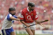 29 June 2003; Setanta O'hAilpin of Cork in action against Ronan Curran of Waterford during the Guinness Munster Senior Hurling Championship Final match between Cork and Waterford at Semple Stadium in Thurles, Tipperary. Photo by David Maher/Sportsfile