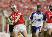 29 June 2003; Niall McCarthy of Cork in action against Eoin Murphy of Waterford during the Guinness Munster Senior Hurling Championship Final match between Cork and Waterford at Semple Stadium in Thurles, Tipperary. Photo by David Maher/Sportsfile