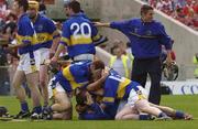 29 June 2003; Tipperary players celebrate their victory after the Munster Minor Hurling Championship Final match between Cork and Tipperary at Semple Stadium in Thurles, Tipperary. Photo by Pat Murphy/Sportsfile