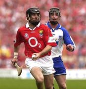 29 June 2003; Ben O'Connor of Cork in action against Eoin Murphy of Waterford during the Guinness Munster Senior Hurling Championship Final match between Cork and Waterford at Semple Stadium in Thurles, Tipperary. Photo by David Maher/Sportsfile