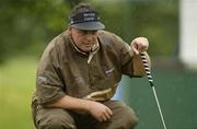 30 June 2003; Darren Clarke of Northern Ireland lines up a putt on the 1st green during a practice round in preparation for The Smurfit European Open at the K Club in Straffan, Kildare. Photo by Damien Eagers/Sportsfile