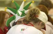 30 June 2003; Ivan Irkri, a Special Olympics Athlete from the Czech Republic, is embraced by a member of the Host Town Skibbereen, at Dublin Airport as the athletes return to their home countries after competing in the 2003 Special Olympics World Games. Photo by Ray McManus/Sportsfile