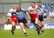28 June 2003; Shane Ryan of Dublin in action against Enda Muldoon of Derry during the Bank of Ireland All Ireland Senior Football Championship Qualifier match between Derry and Dublin at St Tiernach’s Park in Clones, Monaghan. Photo by Damien Eagers/Sportsfile