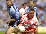 28 June 2003; Darren Crozier of Derry in action against Dessie Farrell of Dublin during the Bank of Ireland All Ireland Senior Football Championship Qualifier match between Derry and Dublin at St Tiernach’s Park in Clones, Monaghan. Photo by Damien Eagers/Sportsfile