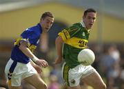 15 June 2003; Robbie Costigan of Tipperary in action against Declan O'Sullivan of Kerry during the Bank of Ireland Munster Senior Football Championship Semi-Final match between Kerry and Tipperary at Austin Stack Park in Tralee, Kerry. Photo by Brendan Moran/Sportsfile
