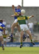 15 June 2003; Fergal O'Callaghan of Tipperary in action against Seamus Scanlon of Kerry during the Bank of Ireland Munster Senior Football Championship Semi-Final match between Kerry and Tipperary at Austin Stack Park in Tralee, Kerry. Photo by Brendan Moran/Sportsfile