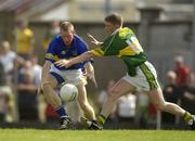 15 June 2003; Shane Maher of Tipperary in action against Mike Frank Russell of Kerry during the Bank of Ireland Munster Senior Football Championship Semi-Final match between Kerry and Tipperary at Austin Stack Park in Tralee, Kerry. Photo by Brendan Moran/Sportsfile