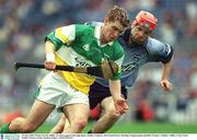 15 June 2003; Brian Carroll of Offaly in action against Darragh Spain of Offaly during the Guinness All Ireland Hurling Championship Qualifier Round 1 match between Dublin and Offaly at Croke Park in Dublin. Photo by Damien Eagers/Sportsfile