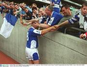 15 June 2003; Hugh Emerson of Laois is congratulated by Laois supporters following his side's victory in the Bank of Ireland Leinster Senior Football Championship Semi-Final match between Dublin and Laois at Croke Park in Dublin. Photo by Ray McManus/Sportsfile