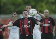 1 July 2003; Alan Murphy of Longford Town in action against David Crawley of Shelbourne during the Eircom League Premier Division between Longford Town and Shelbourne at Flancare Park in Longford. Photo by David Maher/Sportsfile