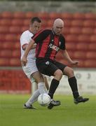 1 July 2003; Patrick Mulvihill of Longford Town in action against David Crawley of Shelbourne during the Eircom League Premier Division between Longford Town and Shelbourne at Flancare Park in Longford. Photo by David Maher/Sportsfile