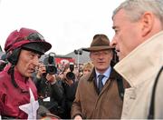 24 April 2013; Jockey Davy Russell speaking with winning owner Michael O'Leary, CEO of Ryanair, and trainer Willie Mullins after winning the Bet Online With TheTote.com Punchestown Gold Cup on Sir Des Champs. Punchestown Racecourse, Punchestown, Co. Kildare. Picture credit: Barry Cregg / SPORTSFILE