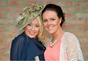 26 April 2013; Tara Thompson, left, from Clane, Co. Kildare, and Niamh Harpur, from Lucan, Dublin, enjoy a day at the races. Punchestown Racecourse, Punchestown, Co. Kildare. Picture credit: Barry Cregg / SPORTSFILE