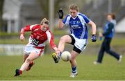 28 April 2013; Ciara Burke, Laois, in action against Briege Corkery, Cork. TESCO HomeGrown Ladies National Football League, Division 1, Semi-Final, Cork v Laois, Sean Treacy Park, Tipperary Town. Picture credit: Diarmuid Greene / SPORTSFILE