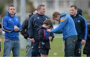 28 April 2013; Leinster's Jordi Murphy signs an autograph during the 2013 Seapoint International Mini Rugby Blitz, the largest rugby mini blitz in Ireland, with over 130 teams taking part. Seapoint RFC, Killiney, Co. Dublin. Picture credit: Brendan Moran / SPORTSFILE