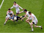 28 April 2013; Bernard Brogan, Dublin, in action against Tyrone players, from left, Patrick McNeice, Plunkett Kane, PJ Quinn and Conor Clarke. Allianz Football League Division 1 Final, Dublin v Tyrone, Croke Park, Dublin. Picture credit: Stephen McCarthy / SPORTSFILE