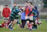 28 April 2013; Jason Mullane, UL Bohemians RFC, is tackled by Mark Newman, left, and Rory Giblin, Seapoint RFC, during their U12's Group match in the 2013 Seapoint International Mini Rugby Blitz, the largest rugby mini blitz in Ireland, with over 130 teams taking part. Seapoint RFC, Killiney, Co. Dublin. Picture credit: Brendan Moran / SPORTSFILE