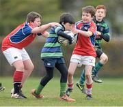 28 April 2013; Harry Wall, Seapoint RFC, is tackled by Conor Burke, left, and Peter Maher, UL Bohemians RFC, during their U12's Group match in the 2013 Seapoint International Mini Rugby Blitz, the largest rugby mini blitz in Ireland, with over 130 teams taking part. Seapoint RFC, Killiney, Co. Dublin. Picture credit: Brendan Moran / SPORTSFILE
