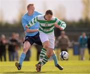 28 April 2013; Patrick Mullins, Pike Rovers, in action against Keith Kirwan, Kilbarrack United. FAI Junior Cup Semi-Final, in association with Umbro and Aviva, Kilbarrack United v Pike Rovers, AUL Complex, Clonshaugh, Co. Dublin. Photo by Sportsfile