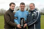 28 April 2013; Greg Dowling, left, Aviva, and Paddy McGrath, right, Chairman of the Junior Council, present John Meleady, Kilbarrack United, with the Man of the Match award. FAI Junior Cup Semi-Final, in association with Umbro and Aviva, Kilbarrack United v Pike Rovers, AUL Complex, Clonshaugh, Co. Dublin. Photo by Sportsfile