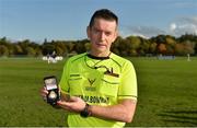 21 October 2017; Referee John Keane with his commemorative medal after the U21 Shinty International match between Ireland and Scotland at Bught Park in Inverness, Scotland. Photo by Piaras Ó Mídheach/Sportsfile