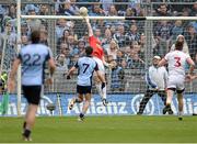28 April 2013; Jack McCaffrey, Dublin, watches as Niall Morgan, Tyrone tips the ball over for his sides final and winning point of the game. Allianz Football League Division 1 Final, Dublin v Tyrone, Croke Park, Dublin. Picture credit: Oliver McVeigh / SPORTSFILE