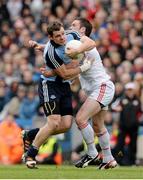 28 April 2013; Kevin McManamon, Dublin, is tackled by Martin Penrose, Tyrone. Allianz Football League Division 1 Final, Dublin v Tyrone, Croke Park, Dublin. Picture credit: Ray McManus / SPORTSFILE