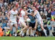 28 April 2013; Kevin McManamon, Dublin, comes under pressure from Tyrone players Ryan McKenna, 24, and Martin Penrose. Allianz Football League Division 1 Final, Dublin v Tyrone, Croke Park, Dublin. Picture credit: Ray McManus / SPORTSFILE