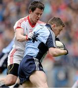 28 April 2013; Paddy Andrews, Dublin, in action against Matthew Donnelly, Tyrone. Allianz Football League Division 1 Final, Dublin v Tyrone, Croke Park, Dublin. Picture credit: Oliver McVeigh / SPORTSFILE