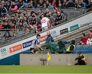 28 April 2013; Both corner forwards, Bernard Brogan, Dublin, and Patrick McNeice, Tyrone, take their seats on the subs bench after they were substituted in the 58th minute. Allianz Football League Division 1 Final, Dublin v Tyrone, Croke Park, Dublin. Picture credit: Ray McManus / SPORTSFILE