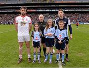28 April 2013; The Tyrone captain, Joe McMahon, referee Marty Duffy and Dublin captain Stephen Cluxton with mascots Kerry Cullen, Beaumount, Emma and Dylan McCormack, Brackenstown, Co. Dublin, before the game. Allianz Football League Division 1 Final, Dublin v Tyrone, Croke Park, Dublin. Picture credit: Ray McManus / SPORTSFILE
