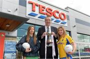 30 April 2013; Paul Fleming, Tesco Coonagh Store Manager, joined Offaly’s Mairead Daly, left, and Roscommon’s Niamh Ward ahead of the Tesco Homegrown NFL Division 4 final clash between the Faithful and the Rossies at the Gaelic Grounds, Limerick, on Saturday 4th May. The Tesco Homegrown NFL Division 4 final which throws-in at 5.00pm will be televised live on TG4 and is the curtain raiser for the Cadbury’s All Ireland U21 Football final between Cork and Galway. TESCO HomeGrown Ladies National Football League Division 4 Final Captain’s Day. TESCO, Coonagh Cross, Coonagh, Limerick. Picture credit: Diarmuid Greene / SPORTSFILE
