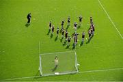 30 April 2013; The team from Sacred Heart of Jesus, Huntstown, Dublin, warm-up before their Scaith Uí Néill Final against Lucan Educate Together at the Allianz Cumann na mBunscol Finals. Croke Park, Dublin. Picture credit: Brendan Moran / SPORTSFILE