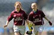 30 April 2013; Joint captains of Scoil Maelruain, Tallaght, Co. Dublin, Georgia Plowman, left, and Orlagh McGuigan, celebrate after winning the Corn Olly Quinlan at the Allianz Cumann na mBunscol Finals. Croke Park, Dublin. Photo by Sportsfile