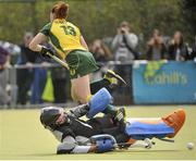 5 May 2013; Emma Smyth, Railway Union, in action against Loreto Hockey Club goalkeeper Jessica Elliott during the shoot-out. Electric Ireland Irish Hockey League Women's Final, Loreto Hockey Club v Railway Union, Three Rock Rovers Hockey Club, Grange Road, Rathfarnham, Dublin. Picture credit: Pat Murphy / SPORTSFILE