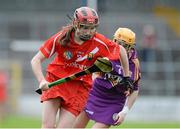 5 May 2013; Katriona Mackey, Cork, in action against Frances Doran, Wexford. Irish Daily Star National Camogie League Div 1 Final, Cork v Wexford, Nowlan Park, Kilkenny. Picture credit: Brendan Moran / SPORTSFILE