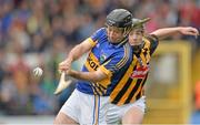 5 May 2013; Conor O'Brien, Tipperry, clears under pressure from Matthew Ruth, Kilkenny. Allianz Hurling League Division 1 Final, Kilkenny v Tipperary, Nowlan Park, Kilkenny. Picture credit: Brendan Moran / SPORTSFILE