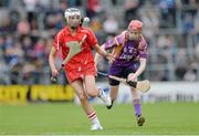 5 May 2013; Aisling Thompson, Cork, in action against Fiona Kavanagh, Wexford. Irish Daily Star National Camogie League Div 1 Final, Cork v Wexford, Nowlan Park, Kilkenny. Picture credit: Brendan Moran / SPORTSFILE